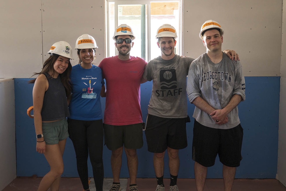 Emergency medicine residents from Banner – University Medical Center Tucson (from left) Veronica Cheng, MD; Ashneet Dhillon, MD; Joshua Pryor, MD; Nolan Lassiter, DO; and Bryan Stilson, MD, all volunteered to work on a Habitat for Humanity Tucson house as part of the EM Day of Service in late September.