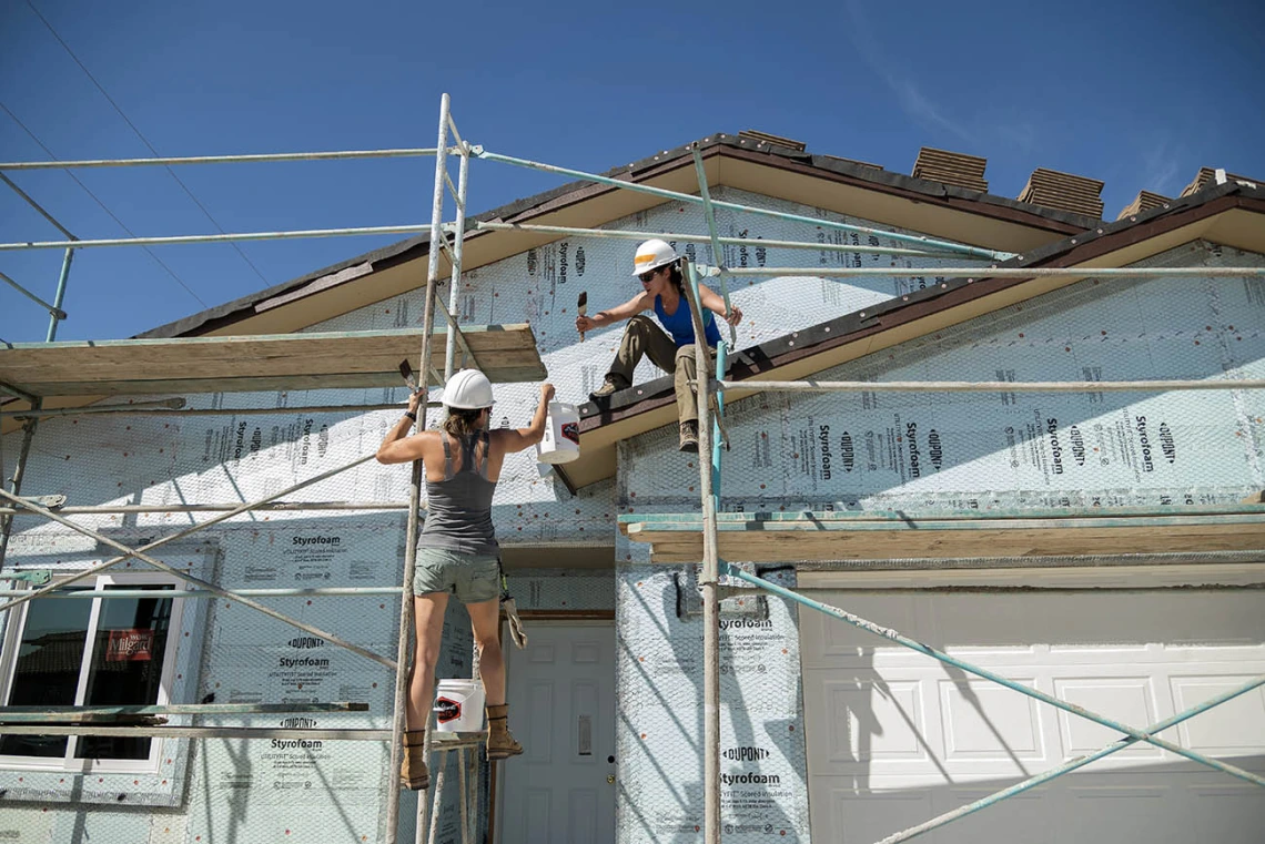 Allison Lane, MD, and Vivienne Ng, MD, MPH, both assistant professors in the Department of Emergency Medicine at the University of Arizona College of Medicine – Tucson, volunteer for the EM Day of Service at a Habitat for Humanity Tucson work site.