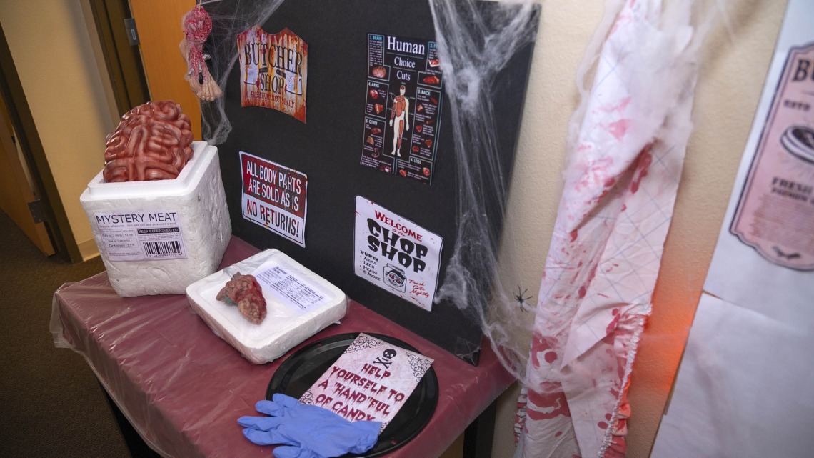 Visitors to the Thomas D. Boyer Liver Institute may lose their appetites after seeing this Halloween snack table with “Mystery Meat” and various other snack-sized body parts. 