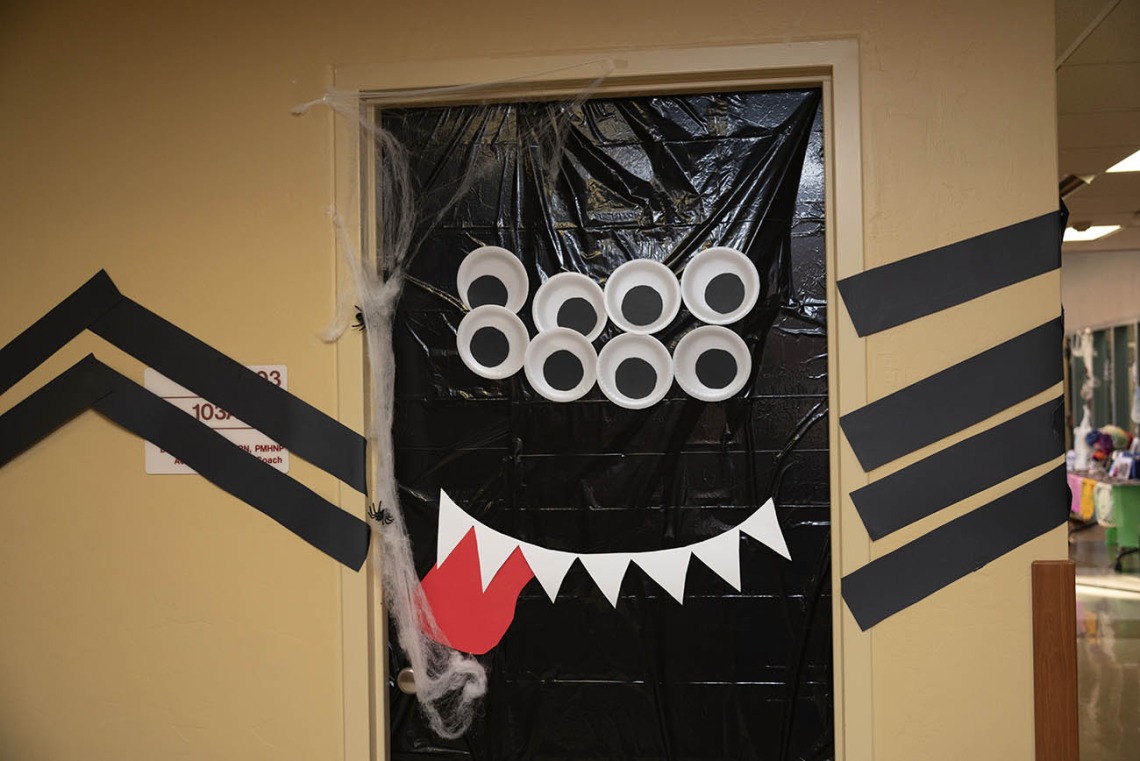 University of Arizona College of Nursing faculty and staff members ramped up their Halloween spirit with a door-decorating contest that included this giant spider, among other creative decorations.