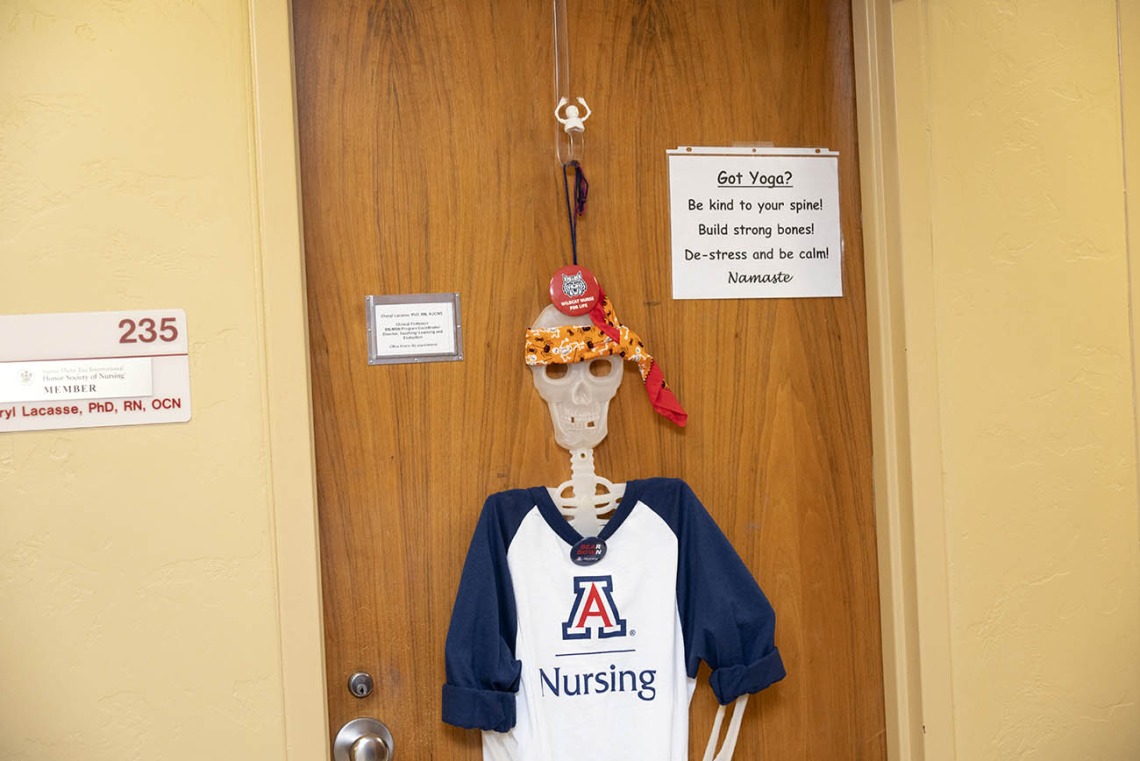 “Be kind to your spine” is the message this College of Nursing skeleton is promoting during the college’s Halloween door-decorating contest. 