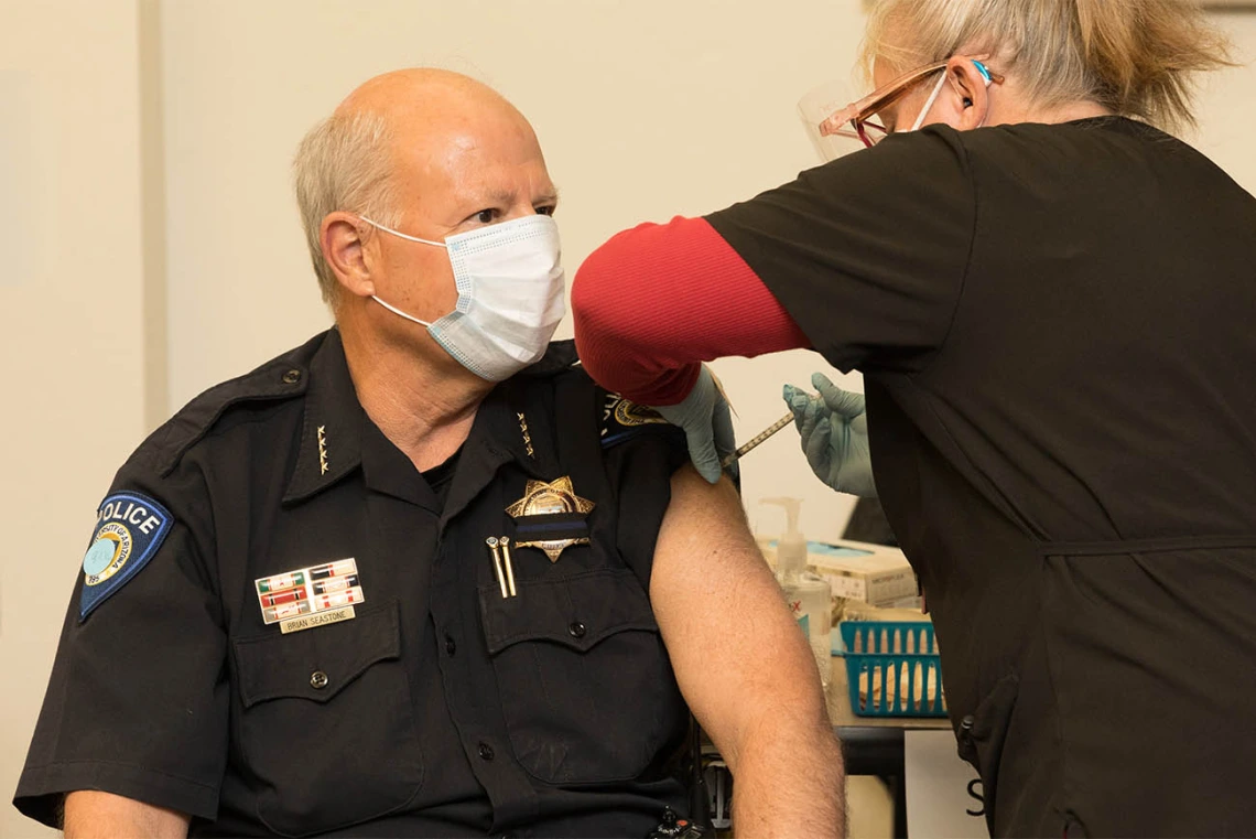 University of Arizona Police Chief Brian Seastone gets vaccinated at Campus Health.