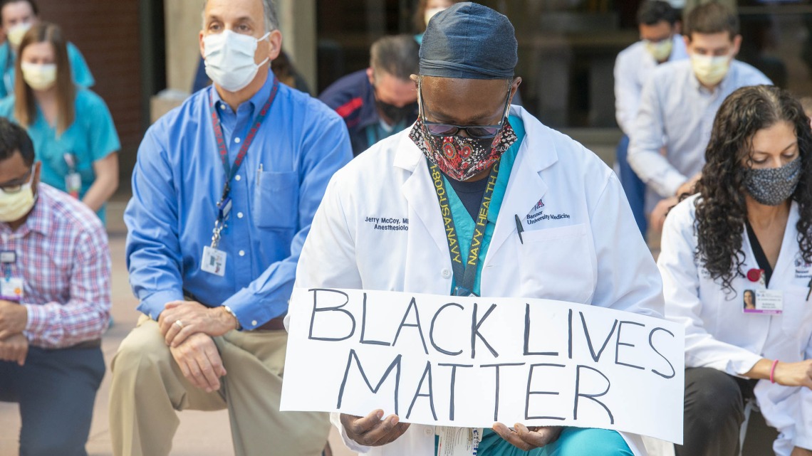 University of Arizona Health Sciences physicians and trainees gathered for a Black Lives Matter silent protest in June 2020 after the death of George Floyd, who had been murdered by a Minneapolis police officer. (Courtesy University of Arizona Department of Surgery)