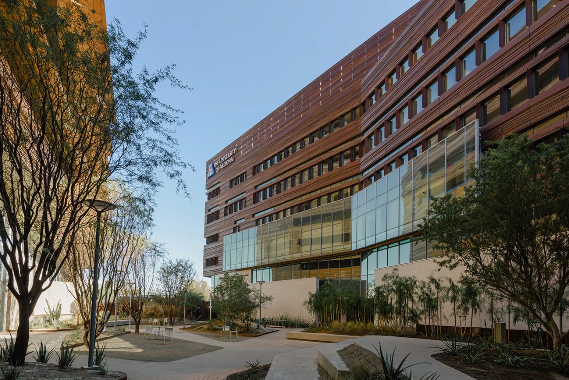 The shade cast in the canyon between the Biomedical Sciences Partnership Building and the Health Sciences Education Building on the Phoenix Biomedical Campus makes this a favorite place for people to congregate on all but the hottest of days.  