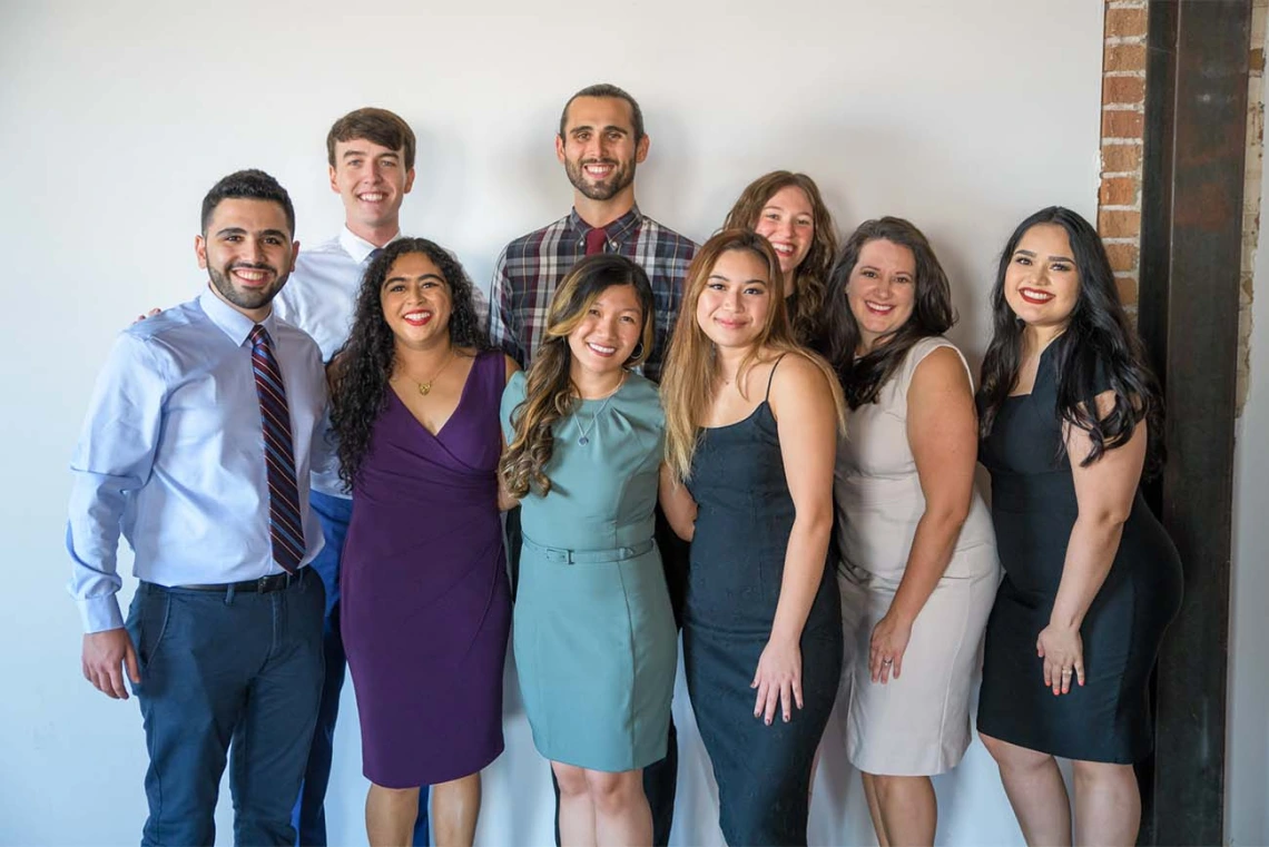 From front left, Obada Abdulrazzak, Sneha Singh, Bernice Alcanzo, Thresa Bui, Avery Williams and Jovanna Figueroa pause for a photo as they prepare for the white coat ceremony with Trevor Smith, Marcus Childs and Lindsey Malecha in the back row.  