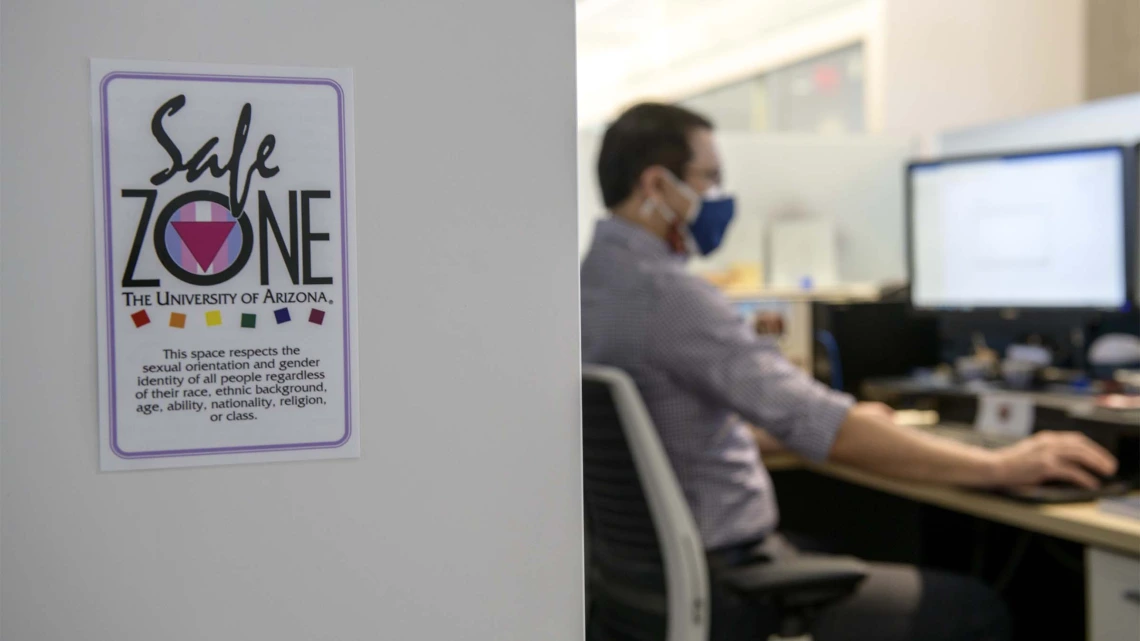 Matt Peters uses a Safe Zone placard to signal an inclusive work environment and spread awareness of training opportunities.