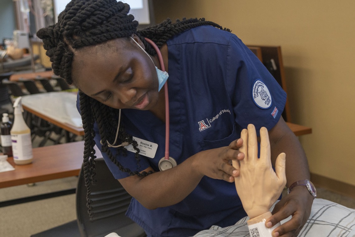 African-American nursing student in simulation lab.