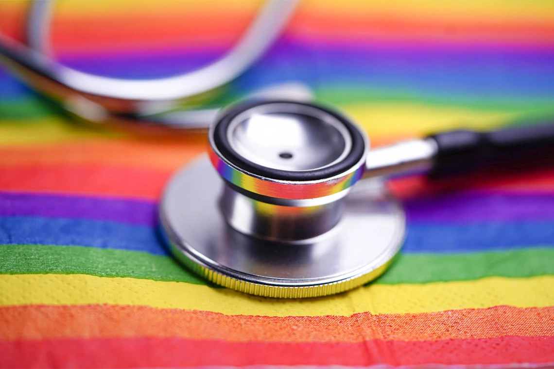 Stethoscope on pride flag.