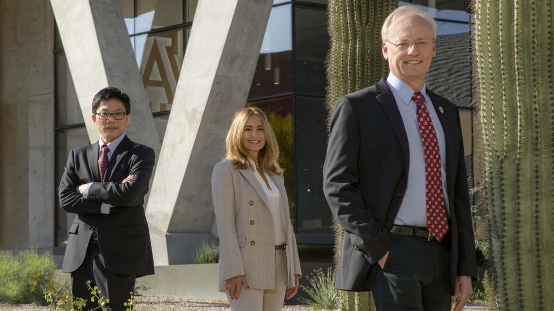 Arizona Center for Drug Discovery Co-Directors, from left, Wei Wang, PhD, and Celina Zerbinatti, PhD, along with College of Pharmacy Dean Rick G. Schnellmann, PhD.