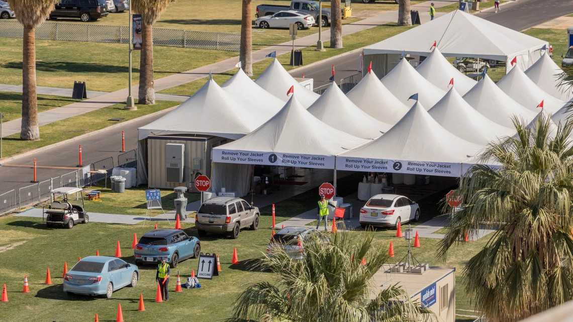 A bird’s eye view of the COVID 19 vaccine point of distribution on the University of Arizona’s mall. The county-run site is drive-through only. Another walk-up site also is available on campus.