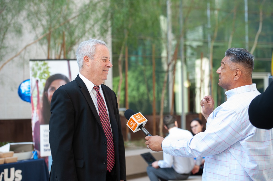 Eric Reiman, MD, chief executive director of Banner Research and principal investigator for All of Us UArizona-Banner, is interviewed by a reporter from Arizona Family 3TV Phoenix during the media luncheon at the Phoenix Bioscience Core.