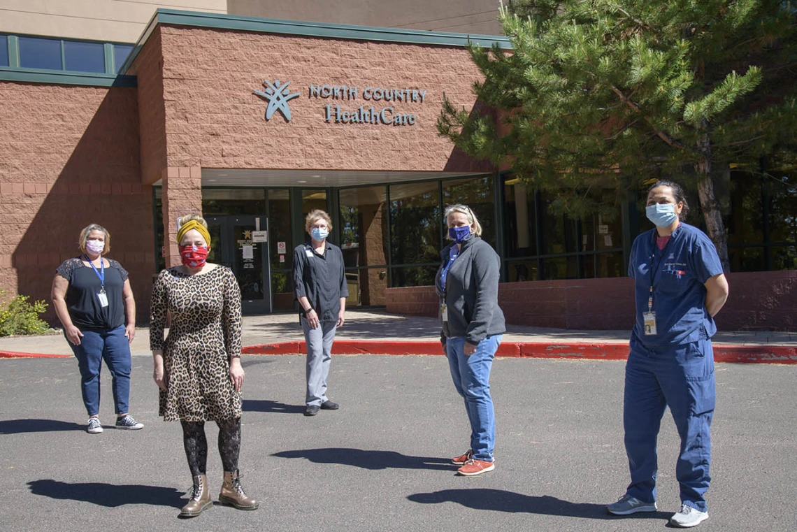 Medical workers prepare to begin antibody testing at a clinic in Flagstaff. Front row: UArizona almuna Charlene Clements, Winslow Indian Health care center, alumna April Alvarez-Corona, chief medical officer of North Country Health Care. Middle row: Anne Newland, chief executive officer of North Country Health Care. Back row: Kelly Kendall, Marti Neff, chief operations officer for North Country Health Care.