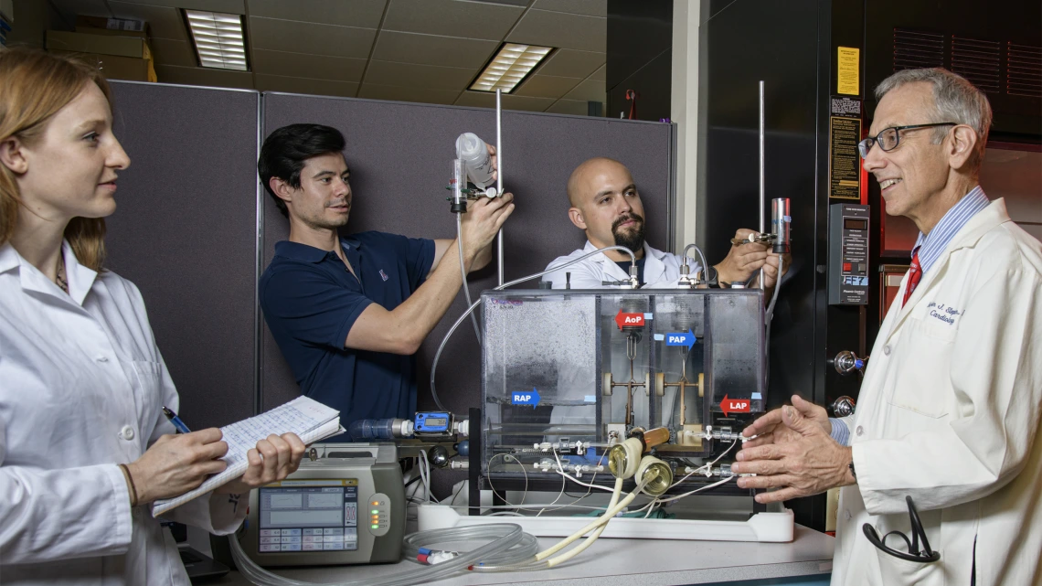 Left to right: Alice Sweedo, PhD candidate; Samuel Miller-Gutierrez; Daniel Palomares (PhD student); and Marvin J. Slepian, MD