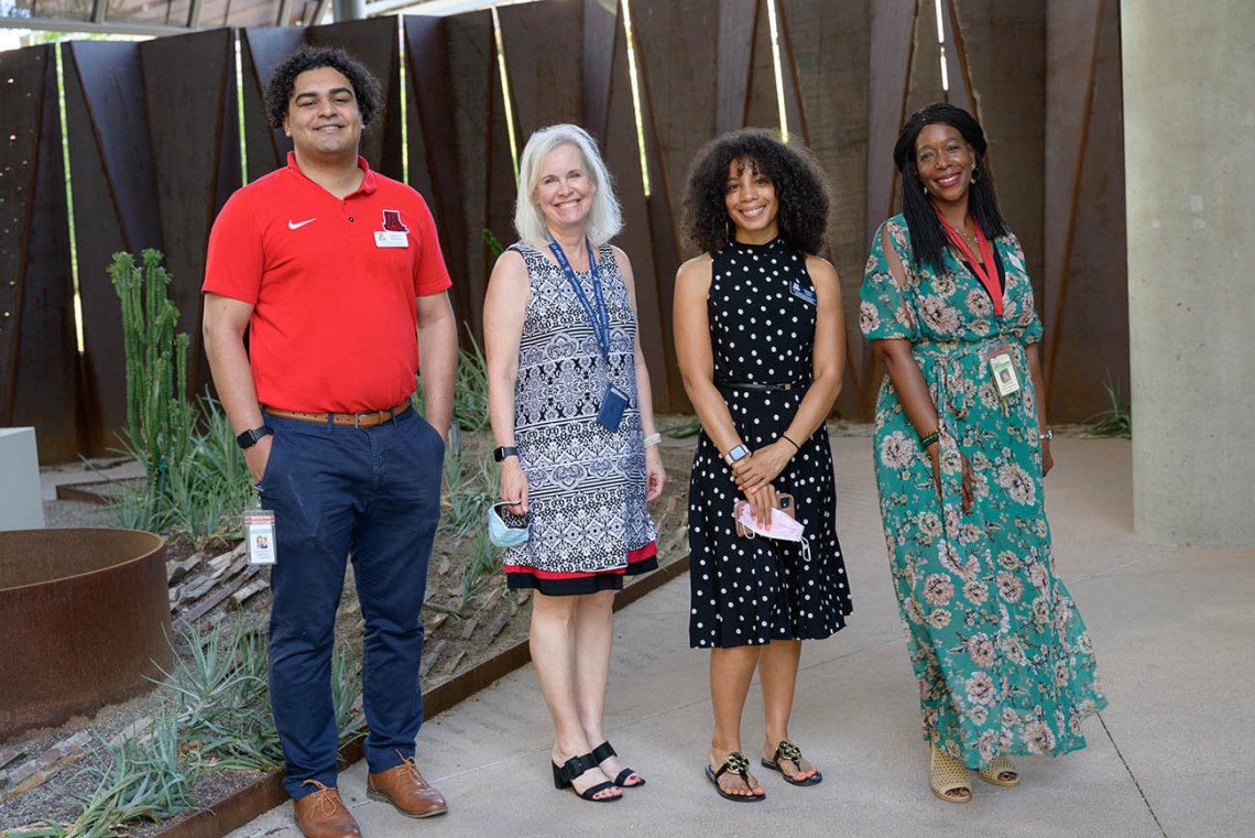 (From left) Office of Equity, Diversity and Inclusion staff members Harrison Williams, community building outreach coordinator, Julie Parrish, administrative associate, Tamara Taylor, outreach coordinator, and Sonji Muhammed Perry, director, organized the College of Medicine – Phoenix blessing ceremony.