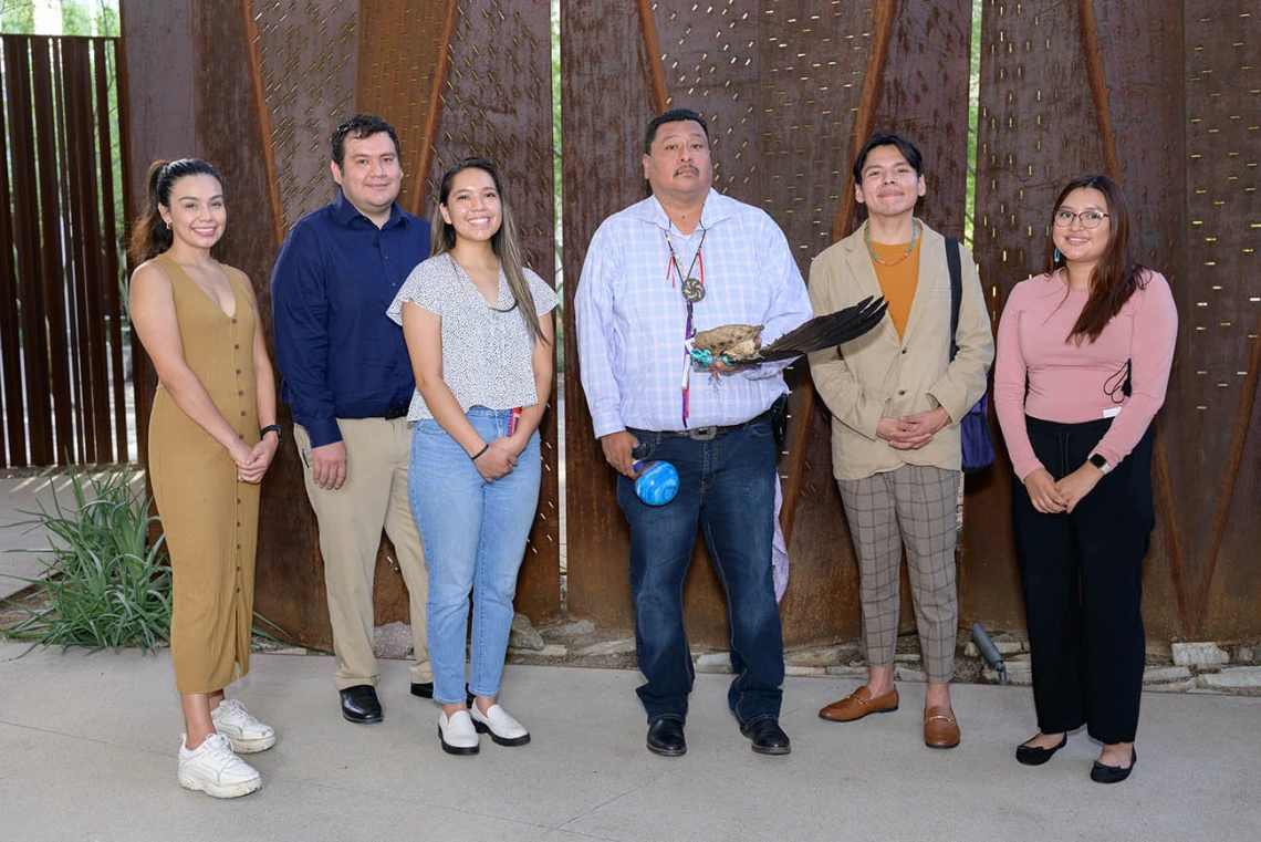 (From left) Jessmin Fernandez, Christopher Danny, Niomi Tsingine, Miguel Flores Jr., Rudy Smith and Micaryn Begay gather after the blessing ceremony. 