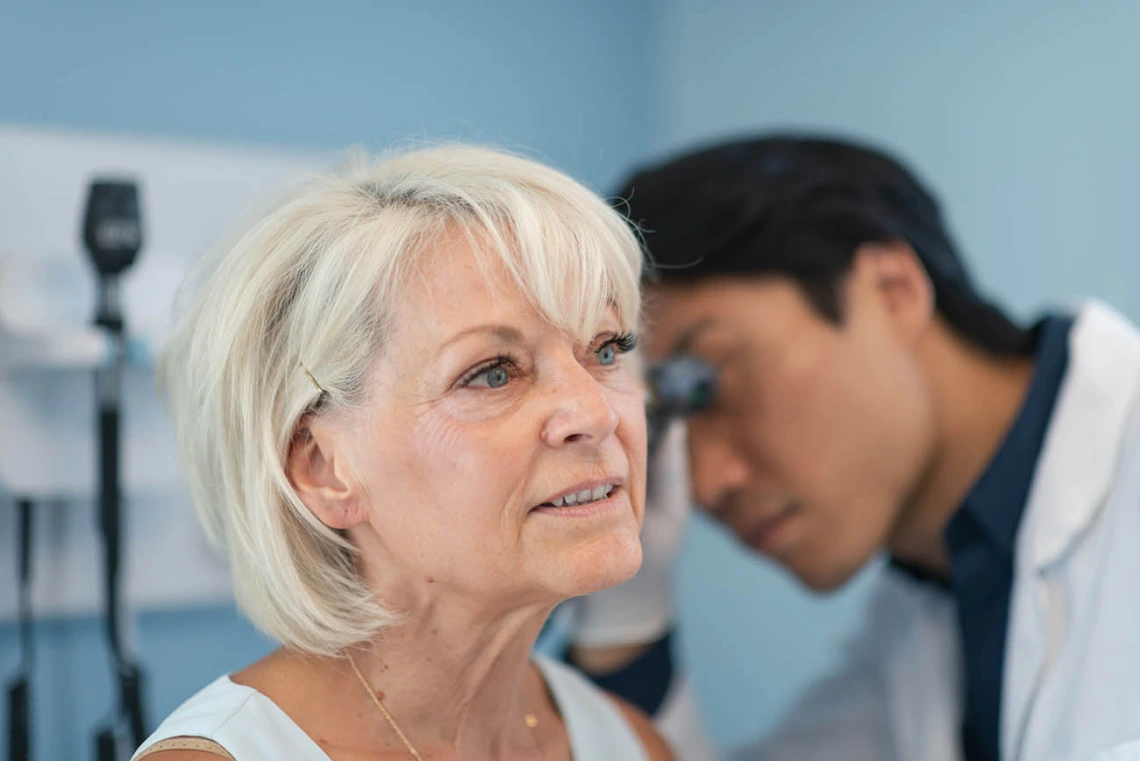 Women having ear examined