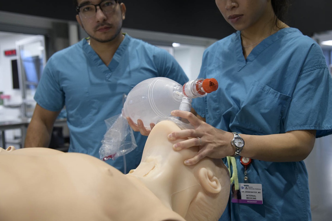 Internal medicine students practice on high-fidelity manikins that can be programmed to simulate a wide range of patients.