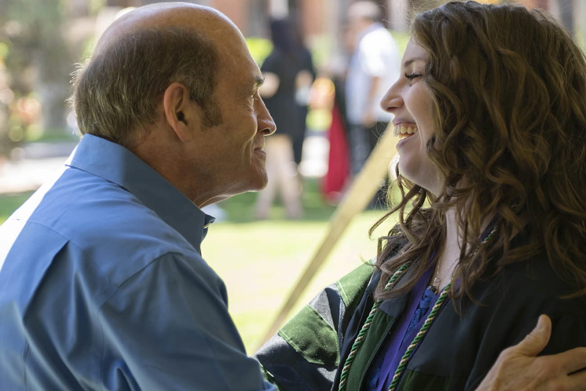 David Waine captures a moment with his daughter, Rayna Schwartz, MD, before she goes into Centennial Hall for the College of Medicine – Tucson class of 2022 convocation. 