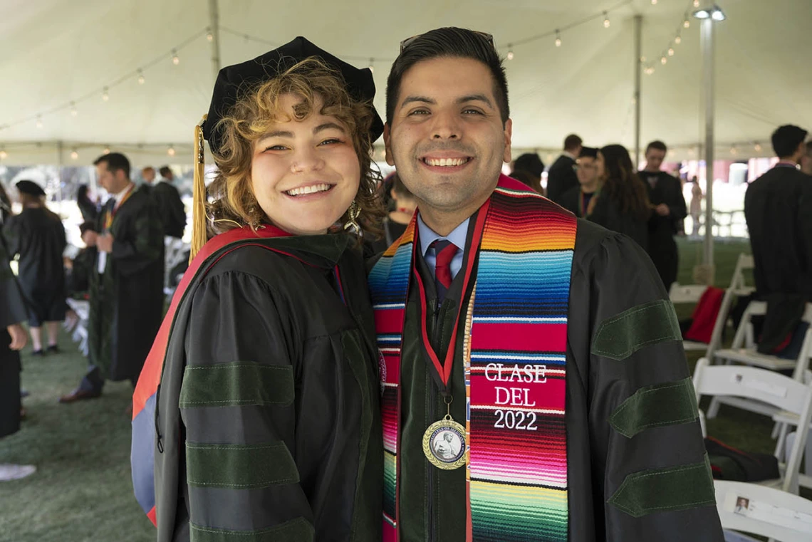 Marisa Delgado, MD, and Eduardo Quiñonez, MD, excitedly wait for their College of Medicine – Tucson class of 2022 convocation at Centennial Hall to begin.