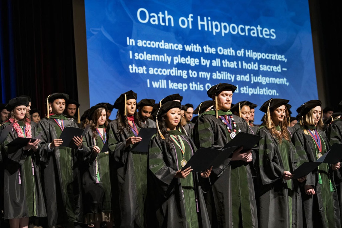 College of Medicine-Tucson graduates recite the Hippocratic Oath near the end of their College of Medicine – Tucson class of 2022 convocation ceremony at Centennial Hall. 