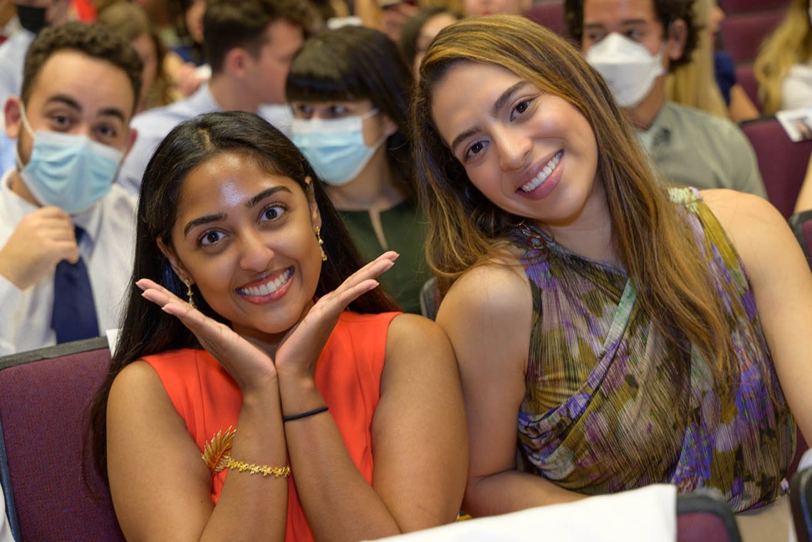 (From left) Martina Francis and Camila Hurtado wait for the UArizona College of Medicine – Tucson Class of 2026 white coat ceremony to begin.  
