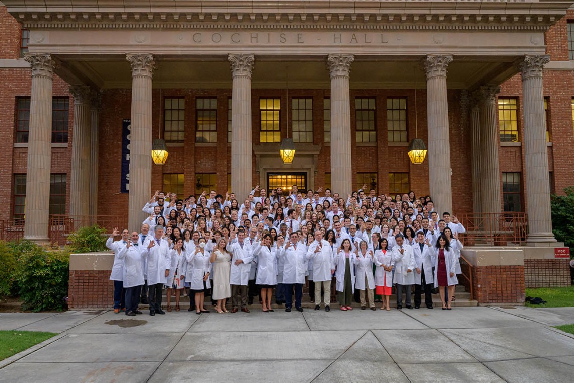 Members of the UArizona College of Medicine – Tucson Class of 2026 and faculty members gather for a photo after the white coat ceremony on July 29.