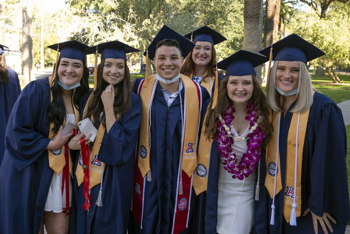 College of Nursing graduates pose for a photo at the fall convocation at Centennial Hall in December.