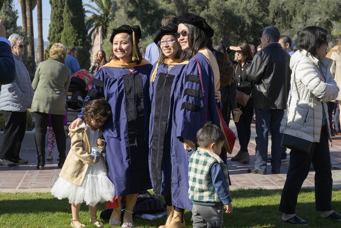 (From left) Doctor of Nursing Practice graduates Suraja Shrestha Bastola, Jinlan Wang and Yan Li pause for a photo after the UArizona College of Nursing fall convocation on Dec. 15.