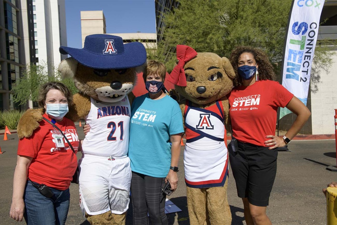 Wilbur and Wilma take a moment to thank UArizona Health Sciences Corporate and Community Relations team members, from left, Caroline Berger, Annemarie Medina and Allison Otu, for organizing the Connect2STEM event. 