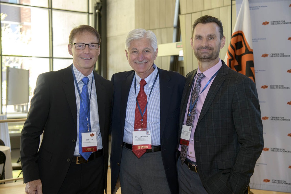 A new partnership between academic medical centers at the University of Arizona and Oklahoma State University involves sharing research assets and knowledge, as well as the preclinical and clinical expertise gleaned from years of research and treatment by scientists and clinicians at both academic medical centers. From left: Todd Vanderah, PhD, Frank Porreca, PhD, Michael D. Dake, MD, Kayse Shrum, DO, Robert C. Robbins, MD, Johnny Stevens, PharmD, Don Kyle, PhD.