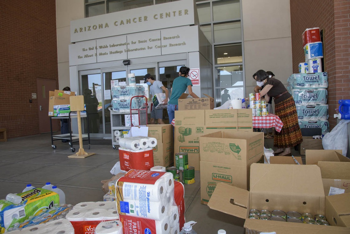 The University of Arizona Cancer Center held a donation drive in late May to assist the Navajo Nation, which has been hard hit by the COVID-19 pandemic. Members of the Partnership for Native American Cancer Prevention (NACP) collected the donations: Margaret Briehl, PhD, principal investigator and professor of pathology; Maria Lluria-Prevatt, PhD, research administrator; Tiffani Begay, MPH, research education core senior program coordinator; Debbie Aguirre, administrative associate.