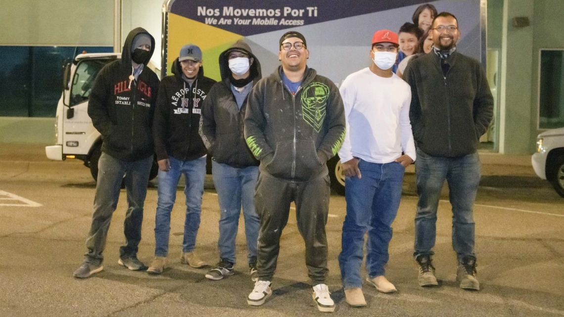 From left: Oscar Moreno, Mara Rodriguez, Jairo Lopez, Ruben Sosa, Nestor Quiñonez and Jesús Pérez – all farmworkers from Agua Prieta, Mexico – gathered at the Consulate of Mexico in Douglas, Arizona, for a COVID-19 vaccine clinic hosted by UArizona Health Sciences and the Cochise County Health Department.