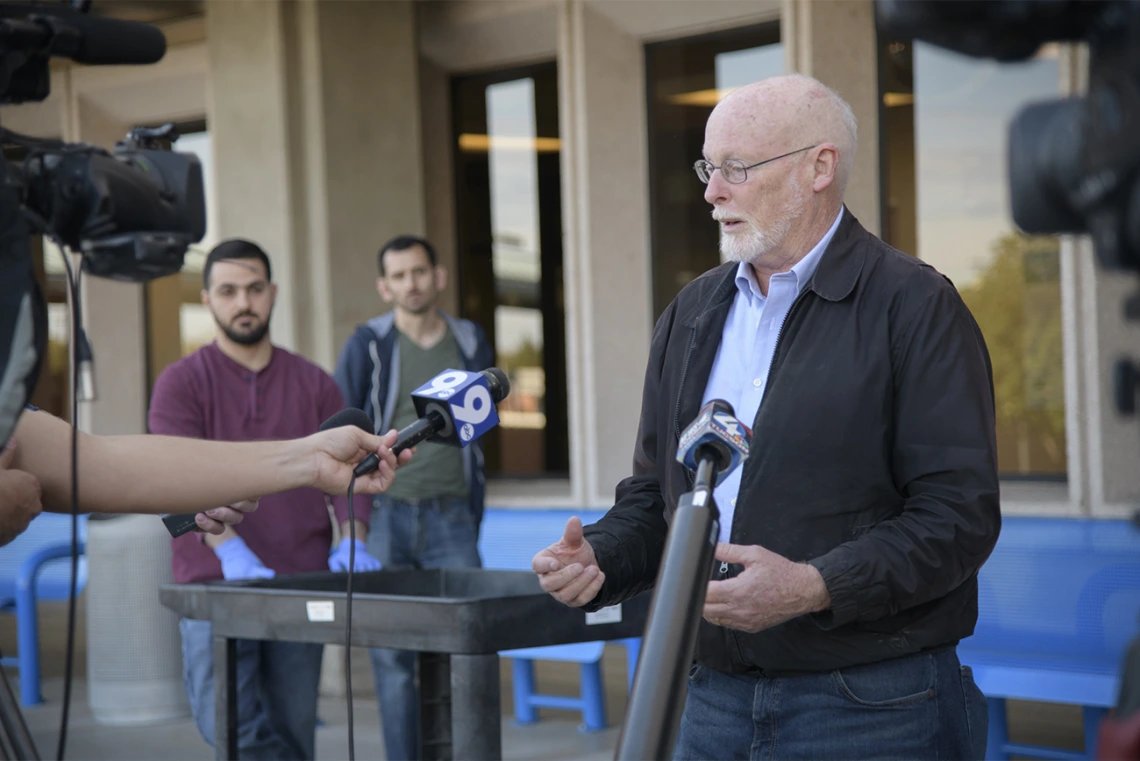 David Harris, PhD, talks to media upon delivery of 1,000 COVID-19 specimen collection kits to Banner-University Medical Center Tucson in April. Dr. Harris is executive director of University of Arizona Health Sciences Biorepository, and spearheaded the effort to create local testing kits so more health care providers in Arizona could administer the test to find out if patients had the virus that causes COVID-19. The effort began in March, and produced thousands of test collection kits per week.