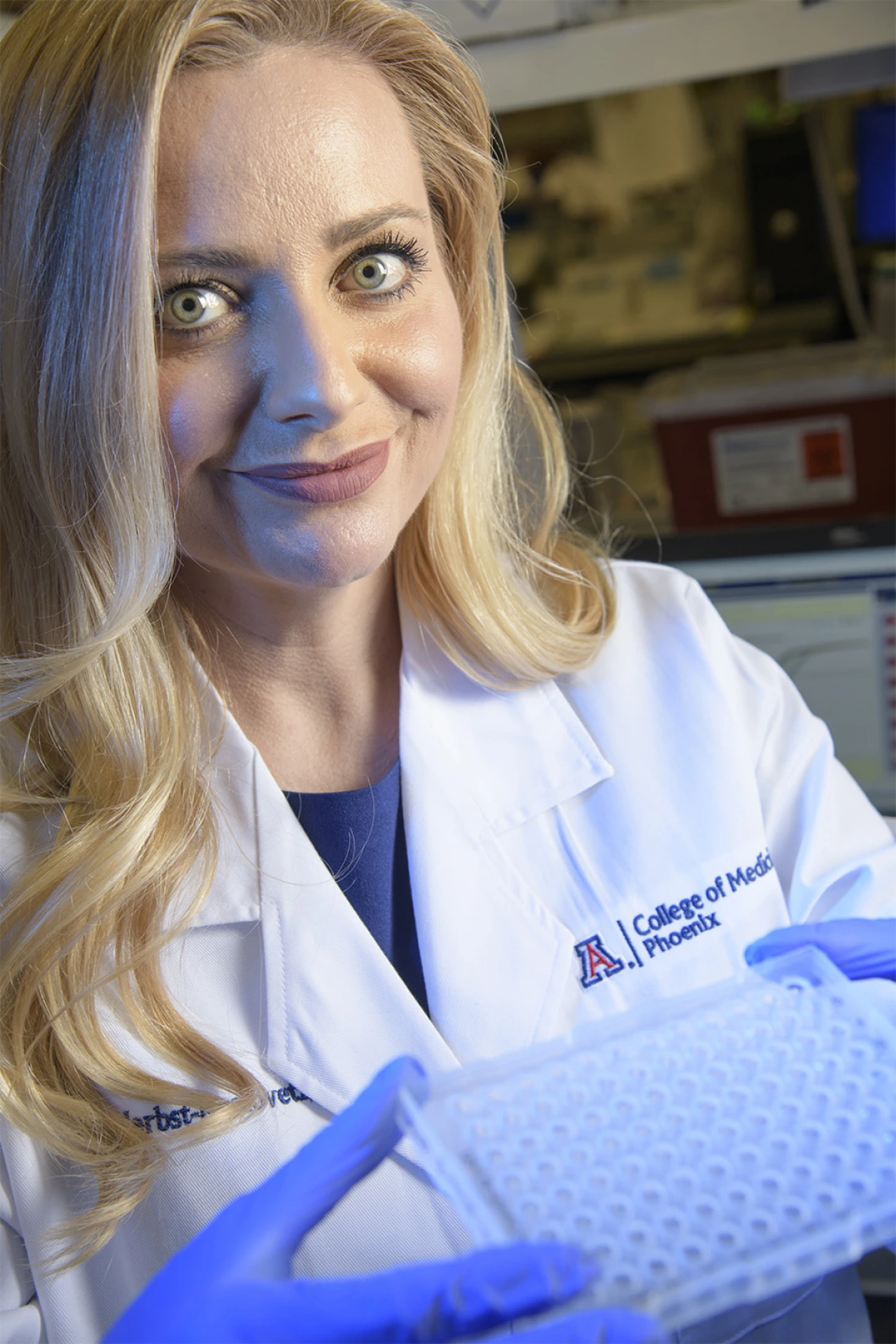 Melissa Herbst-Kralovetz, PhD, with samples that may unlock some clues about vaginal health and gynecologic cancer.