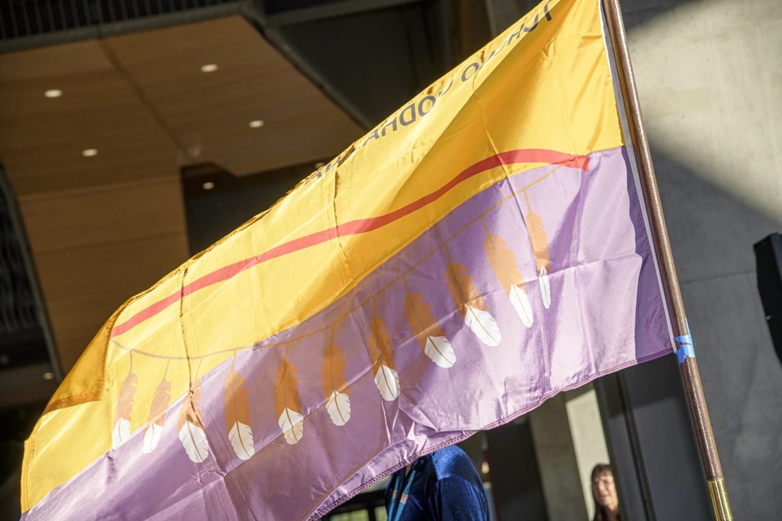 The flag of the Tohono O’odham Nation at the Health Sciences Innovation Building blessing