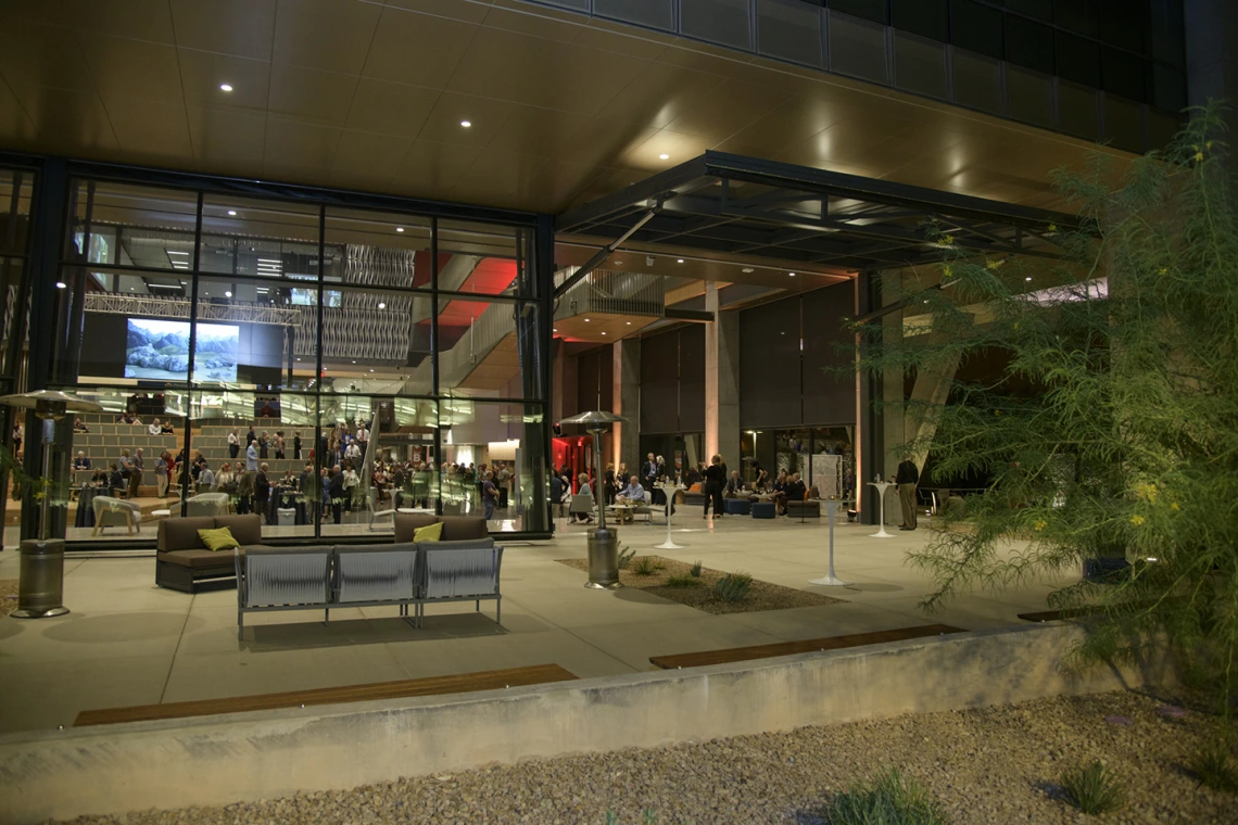 Three large garage doors create an indoor/outdoor environment and extend the space of the Forum.