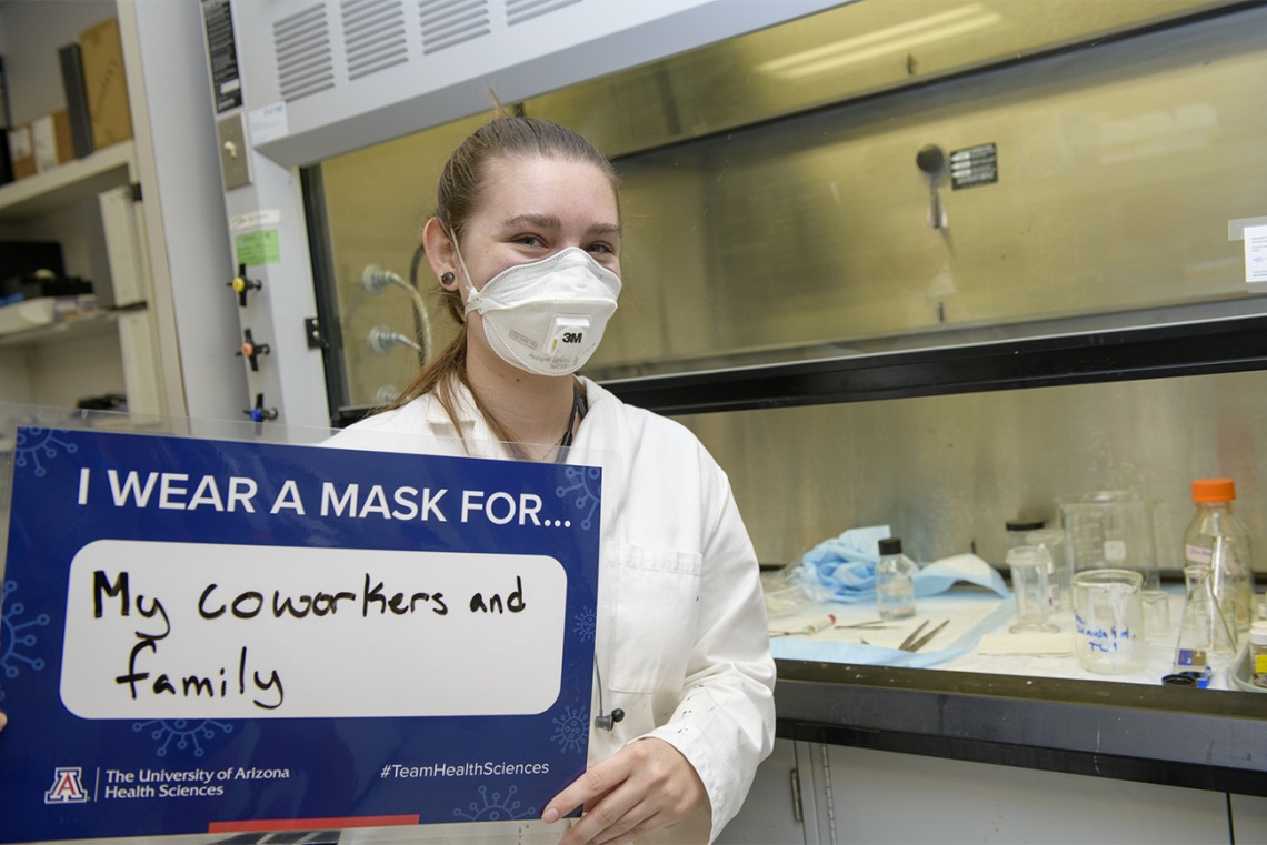 Angela Smith is an undergraduate research fellow studying pain in Todd Vanderah’s lab at the College of Medicine – Tucson. Smith wears a mask for her coworkers and family.
