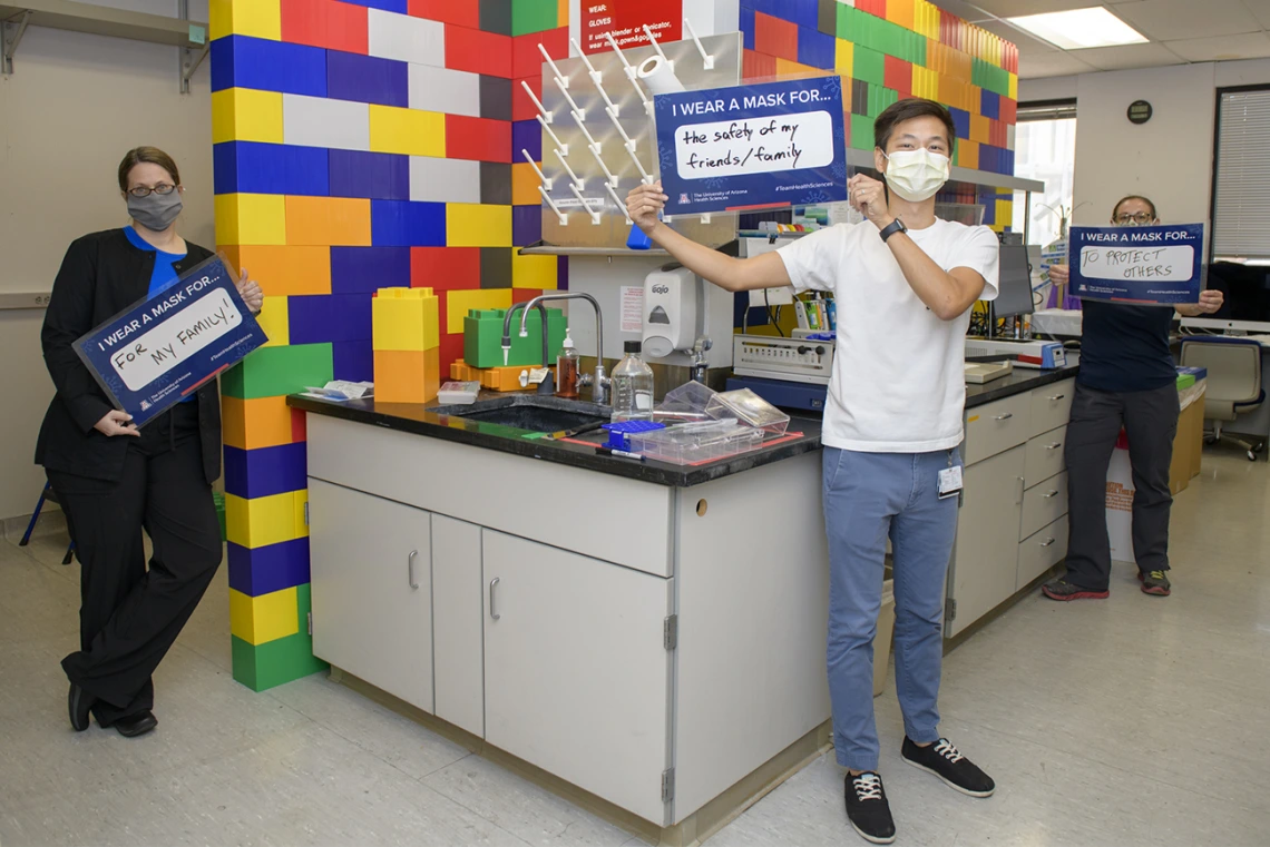 Researchers in the Vanderah Lab study pain and addiction, and wear their masks. 