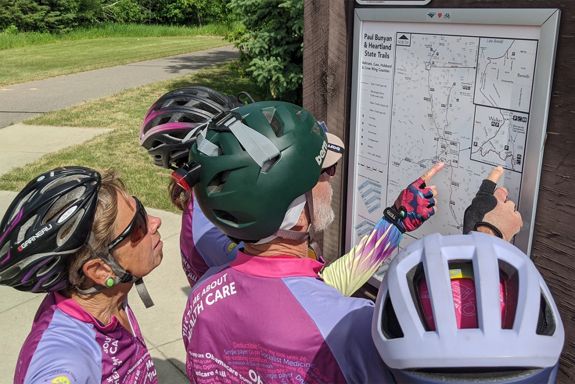 The group discusses the day’s route near Lake Winnibigoshish, Minn.