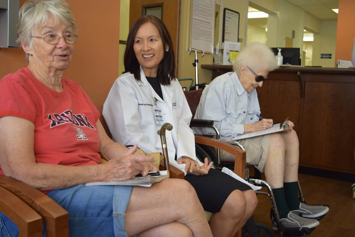 Research led by Dr. Jeannie Lee (center) showed that adults with diabetes or hypertension benefit from physicians, nurses, pharmacists and other health care professionals working together with patients and families. (Photo: University of Arizona Health Sciences/David Mogollon)