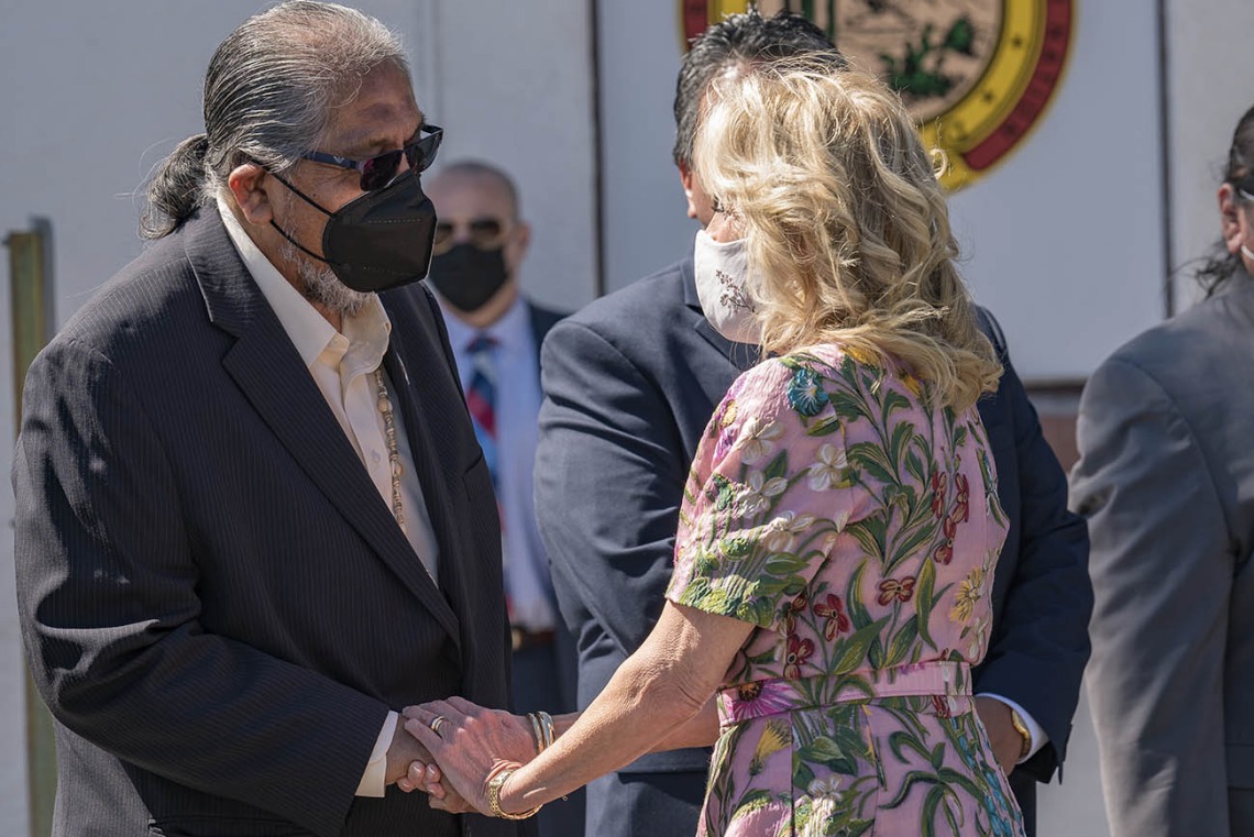 Ned Norris Jr., (left) chairman of the Tohono O'odham Nation, welcomes first lady Jill Biden, EdD, as she visits the San Xavier Health Center in the San Xavier District of the Tohono O'odham Nation on March 8, 2022.