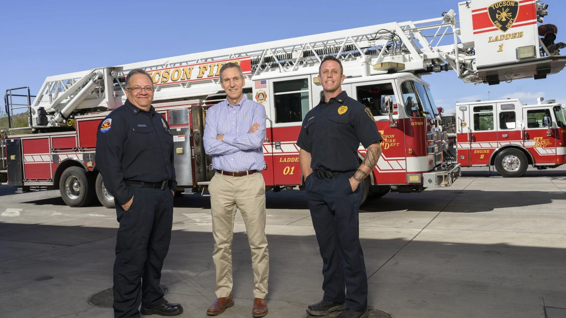 (From left) Tucson Fire Capt. John Gulotta, professor Jeff Burgess, MD, MS, MPH, and Chief Paul Moore have worked closely for 30 years to help reduce risks to firefighter health in Tucson and around the globe.