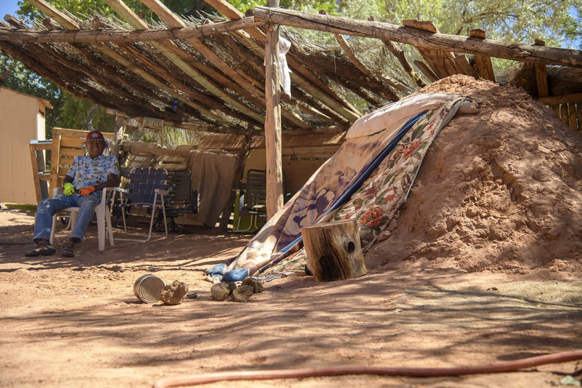 Laurence Kaibetoney monitors a sweat lodge where family come to meditate and reflect. 