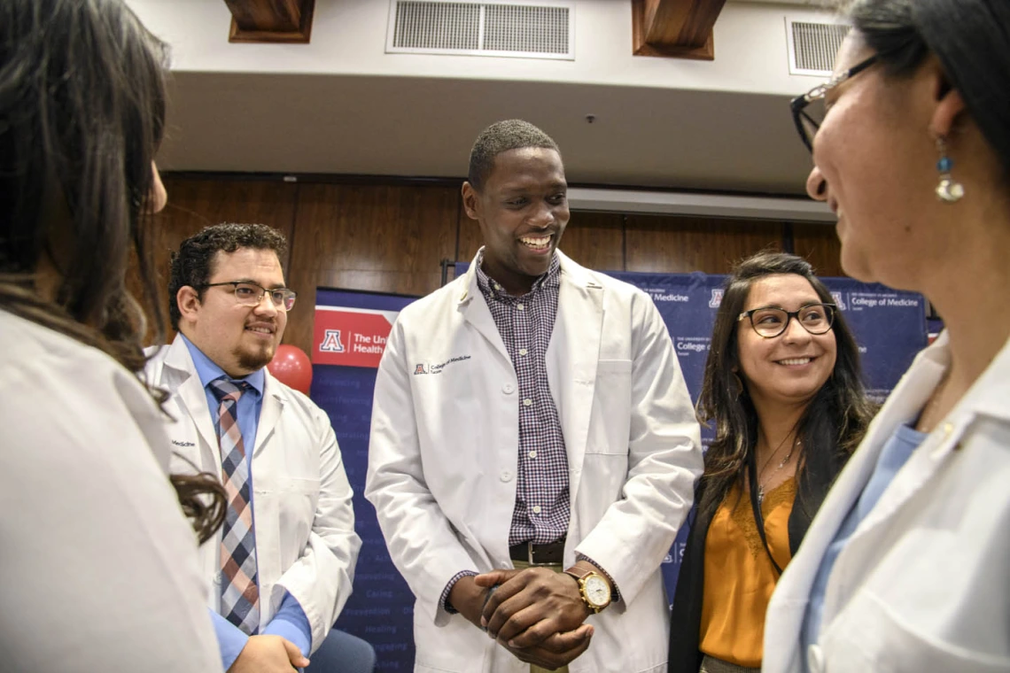 Tucson Primary Care Physician scholarship recipients Raymond Larez, MPH, and Caylan Moore