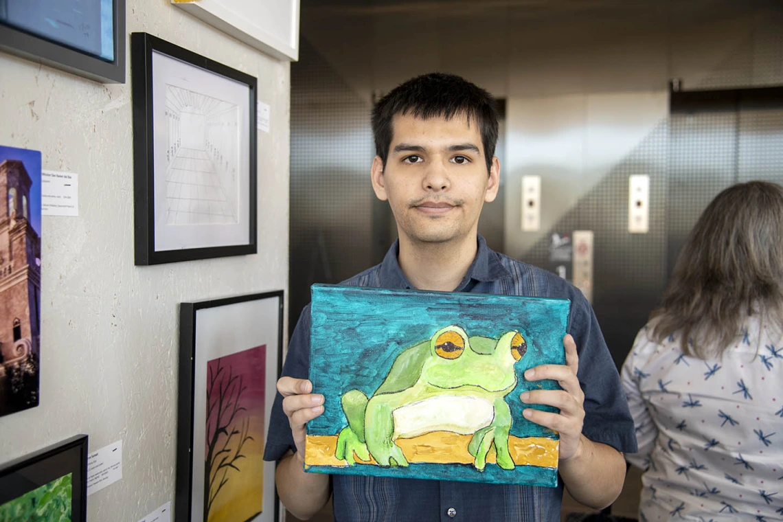 Jon Erath’s entry, “Green Tree Frog.” Erath is a former student worker and current volunteer for ArtWorks at the Department of Family & Community Medicine.