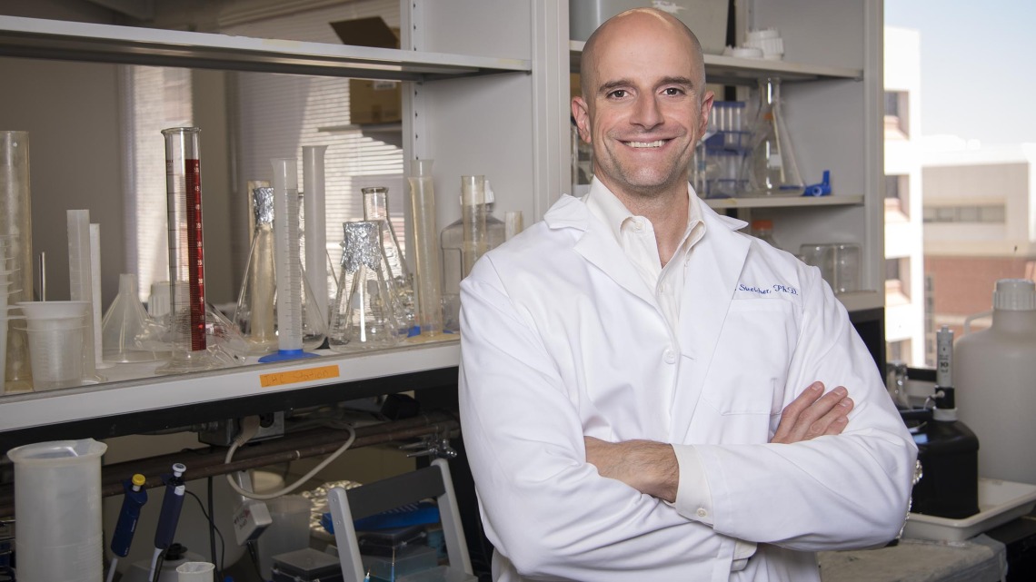 Dr. John Streicher mentors undergraduate and graduate student researchers in his laboratory, where his research program focuses on opioids and pain relief.