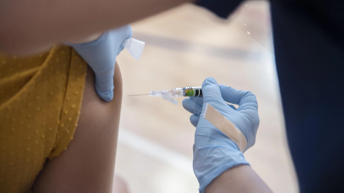 As vaccinations begin for front-line health care workers, experts field questions about the vaccine.