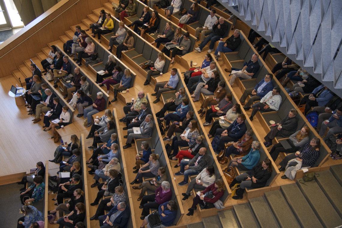 Hundreds of Health Sciences faculty and staff attend a town hall with Michael D. Dake, MD, senior vice president for Health Sciences, in January 2020.