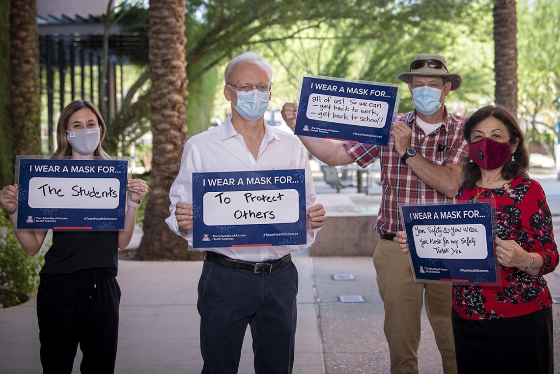 In 2020, the COVID-19 pandemic brought a new awareness to public health prevention measures, including wearing face coverings to prevent the spread of the virus. Pictured from left: College of Pharmacy communicator Ali Bridges; Pharmacy Dean Rick G. Schnellmann, PhD; Mel & Enid Zuckerman College of Public Health communicator Shipherd Reed; Mel & Enid Zuckerman College of Public Health Dean Iman Hakim, MD, PhD, MPH. Each shares why they wear a mask as part of a UArizona Health Sciences “I Wear A Mask” campai