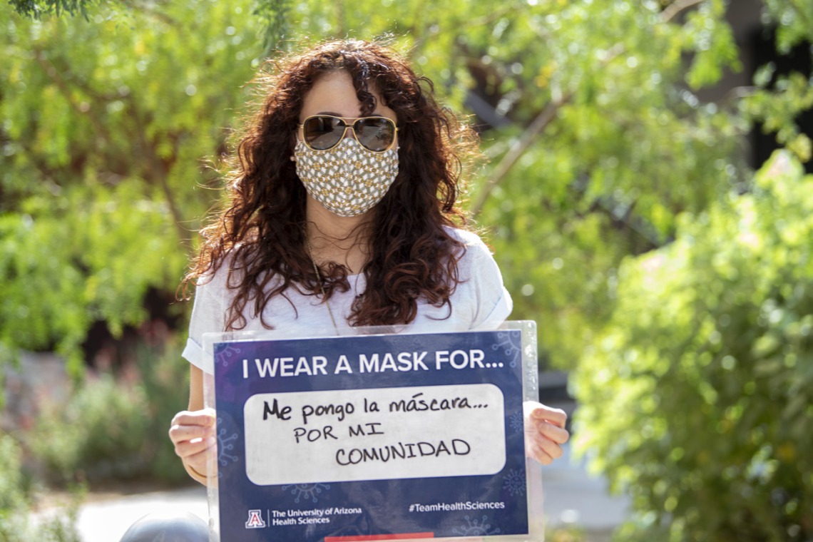 Michelle Ortiz, PhD., of the College of Medicine – Tucson’s Office of Diversity, Equity and Inclusion, wears a mask for her community. 